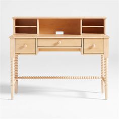 a wooden desk with two drawers and an open shelf on the top, sitting against a white background