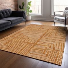 a living room with two couches and a rug