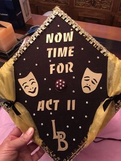 a graduation cap that says now time for act ii and b with masks on it