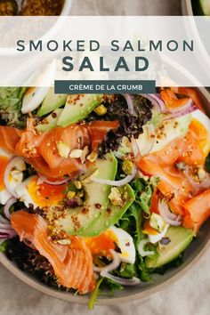 smoked salmon salad with creme de la crumbs in a bowl on a table