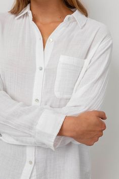 This lightweight button down creates a classic-timeless look when paired with jeans! Relaxed Button-up Shirt With Rolled Sleeves, Casual Shirttail Hem Blouse, Casual Blouse With Button Closure And Shirttail Hem, Casual Shirttail Hem Blouse With Button Closure, Classic Blouse With Shirttail Hem For Casual Gatherings, Timeless Relaxed Fit Button-up Shirt, Timeless Button-up Summer Shirt, Timeless Relaxed Fit Shirt For Spring, Timeless Button-up Shirt For Summer