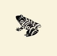 a black and white drawing of a frog