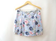 "- Pleated denim skort - Blue floral 100% cotton fabric - Elastic waistband on back - Made in USA ~DETAILS~ BRAND: Swat ERA: 1990's CONDITION: Good! ~SIZING~ TAG SIZE: 16.5\" FITS LIKE: Extra Large MEASUREMENTS WHEN LAID FLAT: LENGTH= 17\" WAIST= 15\" HIPS= 19\" INSEAM= 4\"" 90s Mini Skirt, Goth Hippie, Bohemian Goth, Womens Skorts, Preppy Grunge, Pleated Denim, Dark Blue Denim Jeans, Denim Skort, Burgundy Lace