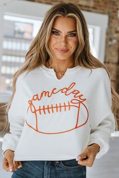 Elevate your game day look with our Game Day Cropped Sweatshirt! Available in sizes S-XL, this trendy sweatshirt is designed with both style and comfort in mind. Show off your team spirit in this cropped sweatshirt that will keep you warm and stylish during those chilly game days. Perfect for any sports fan, this sweatshirt is a must-have addition to your game day wardrobe. Model Info: Models are 5'7", Size 2, wearing smalls Material: 65% Polyester + 35% Cotton Trendy Games, Night Pajama, Sports Event, Peach Love, School Dresses, Cropped Sweatshirt, Style Maxi Dress, Womens Clothing Stores, Fall Shopping