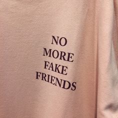 a pink shirt with the words no more fake friends printed on it's chest