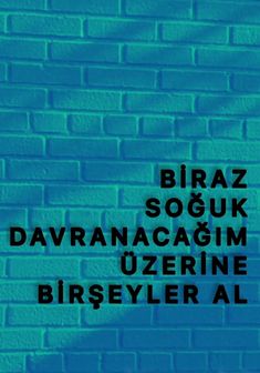 there is a brick wall with words written on it in black and blue letters that read biraz, soukk, davanacami, uzerine, bresyler al