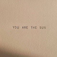 an old typewriter with the words you are the sun printed on it's paper