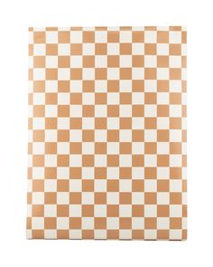 an orange and white checkerboard pattern is shown on the side of a piece of paper