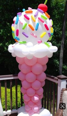 a large balloon sculpture made to look like an ice cream cone