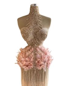 Tassel Feather Nude Pink Dress with such an unique fabric it shows the elegance of the high neckline corset that is made by crystals, and the skirt with pink feathers and tassel fringe details. Gown With Feathers, Pink Feather Dress, Nude Pink Dress, Transparent Corset, High Fashion Outfits, Queen Dress, Unique Fabric, Pink Feathers, Victoria Secret Fashion