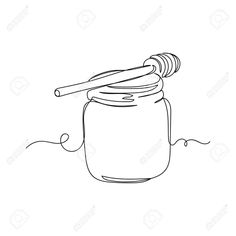 a jar with honey and a wooden stick in it on a white background stock photo