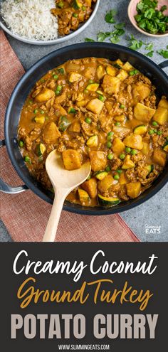 creamy coconut ground turkey and potato curry in a skillet with rice on the side