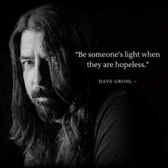 a man with long hair and beard in black and white text that reads, be someone's light when they are nopeless