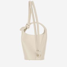 100% Leather | Jacquemus Women's Le Petit Tourni Bag in Light Ivory | SS24 Jacquemus Bag Cream, Jacquemus Bag Le Chiquito Long, Jacquemus Le Chiquito Noeud Leather Shoulder Bag, Light Brown Jacquemus Bag, Jacquemus Bag Le Bambino, Light Ivory, Saint Laurent Shoes, Sneaker Wedge, Pendant Rings