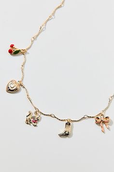 Delicate chain necklace finished with a collection of charms. Features Stella delicate charm necklace Delicate chain necklace Finished with a collection of charms Adjustable lobster closure Content + Care Mixed metal Avoid contact with water Imported Size Dimensions: 16" l | Stella Delicate Charm Necklace in Gold, Women's at Urban Outfitters Delicate Chain, Mixed Metals, Charm Necklace, Women's Accessories, Color Coding, Cool Girl, Urban Outfitters, Chain Necklace, Shoe Accessories