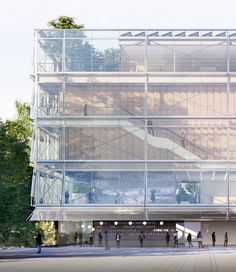 people are walking around in front of a large glass building with stairs on the side