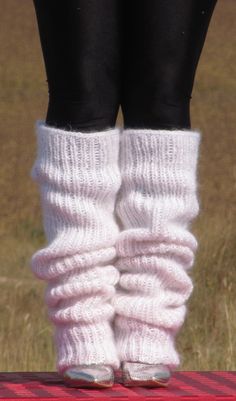 HAND KNITTED GAITERS / LEG WARMERS ### DESIGNED & CREATED by Giorgio Qualitat ### Product Specification: §  Color:         White; §  Style:          Ribbed hand knitted gaiters; §  Material:     2 strands premium class longhair mohair; Size & Measurements: §  Length: 40.9 " / 104 cm §  Circumference at the upper end:    19.7 '' / 50 cm §  Circumference at the lower end:     9.4 '' / 24 cm §  Net weight: 488 g All measurements are taken with the item laid flat and not stretched. The lady modeling Aesthetic Leg Warmers, White Leg Warmers, Soft Knitted White Leg Warmers, White Stretch Knitted Leg Warmers, White Knit Leg Warmers One Size, White Knee-high One Size Leg Warmers, White Knitted One-size Leg Warmers, Leg Warmers Aesthetic, Knitted Leg Warmers