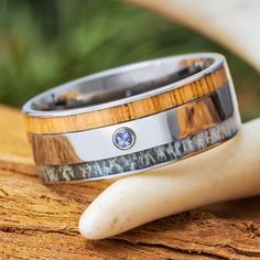 Oak and Antler Wedding Band with Alexandrite Antler Rings For Men Stone Forge Studios, Deer Antler Mens Wedding Ring, Deer Antler Wedding Band, Deer Antler Wedding, Antler Rings For Men Antlerrings.com, Antler Wedding Band, Antler Wedding, Alexandrite Stone, Antler Jewelry