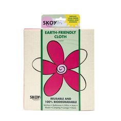 a package of cloth with a pink flower on the front and green border around it