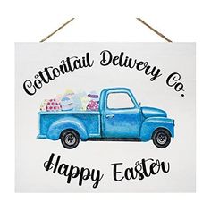 a sign that says colonial delivery co happy easter with an old blue pickup truck filled with eggs