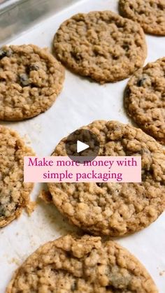 cookies on a baking sheet with the words make more money with simple packaging