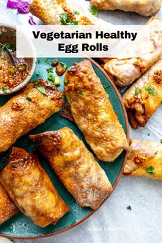 vegetarian healthy egg rolls on a plate with dipping sauce