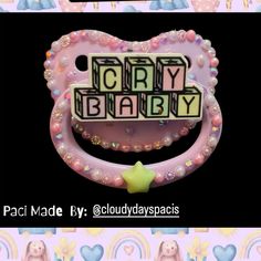 an image of a baby pacifier with the word sorry baby spelled in it's teeth