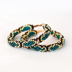 Wonderful turquoise hoop earrings will be great birthday gift for women.This earrings is made of highest quality Japanese Toho beads. Diameter of hoops : 2.2 inch 100% handmade. Packed in gift bag.You will receive the same piece as pictured!!!Piece of my soul, which I left in this work, will warm you even in the most difficult and sad days. I am sure; this earrings will become your lucky charm that you would enjoy wearing day and night. Thick Hoop Earrings, Oversized Earrings, Turquoise Hoop Earrings, Beaded Hat, Turquoise Hoops, Toho Beads, Beading Jewelery, Birthday Gift For Women, Snake Earrings