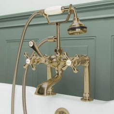 an old fashioned bathtub faucet with two handset