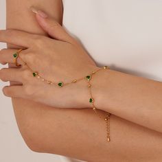 ✦ Unleash your colorful and playful side with our Evil Eye Pearl Slave Ring Hand Chain Bracelet! This bohemian-inspired piece features a butterfly and lucky clover leaf with pearl beads, perfect for any beach party or formal occasion. The adjustable open cuff ensures a perfect fit, while the gold-plated stainless steel is hypoallergenic. Get ready to rock this Y2K feel all summer long! ----------- DETAILS ----------- - Color: Gold - Pattern: Style 1- Style 8 - Size: Please refer to the parameter of each ring chain bracelet - Ring Size: Open & Adjustable - Materials: Gold Plated, Surgical Steel, Cubic Zirconia, Glass, Enamel *Stainless Steel is hypoallergenic, generally safe for sensitive skin. - SKU: TYB006 Ring With Bracelet Attached, Chain Ring Bracelet, Ring Y2k, Hand Chain Bracelet, Ring Bracelet Chain, Mens Athletic Wear, Ring Chain, Ring Hand, Heart Shaped Rings