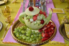 there are pictures of fruits and vegetables on the table