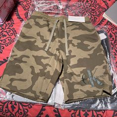 Nwt Color Is Dusty Olive Camouflage Is Print Authentic Guaranteed Bought From Calvin Klein Site Ck Print On Front Left Short Leg Size Is Mens Medium Smoke Free Home Pet Friendly Home I Have A White German Shepherd He May Leave Some “Love Lochs” Behind Open To Offers Bundle To Save Shipping Bundle To Discount Same Day To Next Day Shipping All Sales Final White Swim Trunks, Sweat Shorts Men, Calvin Klein Swimwear, White German Shepherd, Casual Summer Pants, Calvin Klein Shorts, Chino Jeans, Active Wear Shorts, Fleece Shorts