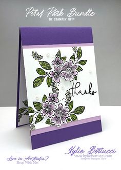 a purple and white greeting card with flowers on the front, says thank you by stampin'up