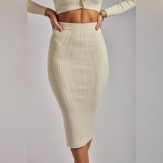 New. Never Worn. Elegant Beige Ribbed Skirt, Spring Ribbed Beige Skirt, Fitted Ribbed Knee-length Skirt, Ribbed Fitted Knee-length Skirt, Fitted Ribbed Midi Skirt, Trendy Fitted Ribbed Skirt, Fitted Ribbed Skirt, Fitted Ribbed Solid Color Skirt, Spring Ribbed Fitted Skirt