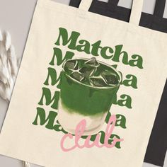 Matcha Lover Tote Bag - Sip, Shop, Repeat! For all the matcha enthusiasts out there, this tote is your new go-to for every occasion. With 20" handles, it's designed to be easy on the shoulders--even when you're carrying a week's worth of shopping, snacks, or your latest matcha haul. The cotton canvas ensures it's built to last through K-drama marathons, grocery runs, and everything in between. Available in natural and black, it's as fashionable as it is functional. Whether you're toting around your dreams or just your matcha latte, this bag's got you covered! Features: 100% cotton canvas (because quality matters!) Sturdy fabric (12 oz/yd² - built to last) Available in two colors: natural and black Perfect for carrying your matcha, your snacks, and all your essentials! Green Bag With Letter Print For Gift, Green Letter Print Bags As Gifts, Eco-friendly Green Bag With Letter Print, Eco-friendly Green Bags With Letter Print, Matcha Lover, Canvas Bag Design, Snack Bags, Matcha Latte, K Drama