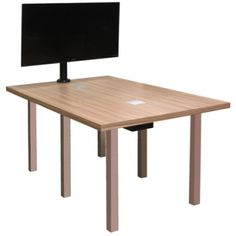 a computer desk with a monitor on it