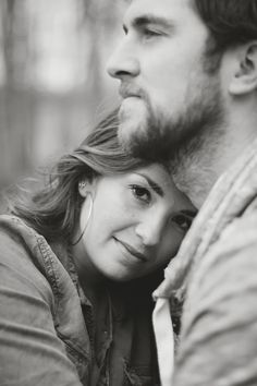 black and white photograph of a couple embracing each other