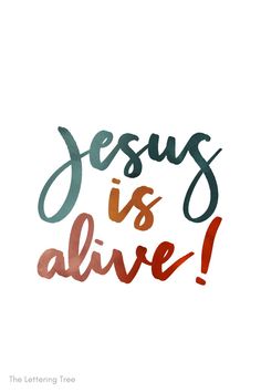 the words jesus is alive are painted in red, green and orange on a white background