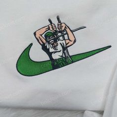 Welcome to the world of Zoro from One Piece with our exclusive Nike Swoosh Shirt! Made from premium quality fabric, Jersey Bedding, One Piece Hoodie, Hoodie Collection, Anime Sweatshirt, Nike Swoosh Logo, Disney Hoodies, Zoro One Piece, St Patrick's Day Gifts, Nike Sweatshirt