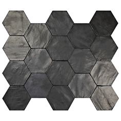 a hexagonal tile pattern with black and grey colors