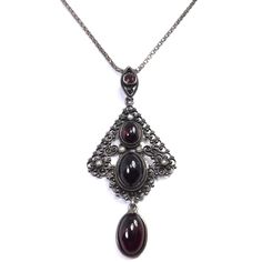 Amazing pendant with ornate 800 silver filigree cabochon garnets and seed pearls. The pendant measures 1 and ¾ inch tall by 1 and ¼ inch wide. It is on a more modern sterling silver box chain that measures 17.5 inches long. Pendant is marked 800, chain is marked 925 Italy. Excellent condition, very light wear for the age c. 1910. Carved Shell, Sterling Silver Cuff Bracelet, Silver Engraving, Silver Box, Silver Bangle Bracelets, Seed Pearl, Long Pendant, Sterling Silver Cuff, Silver Filigree