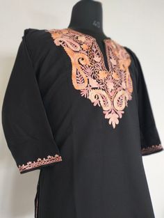 Kashmiri Aari Embroidered Black short top with aari embroidery around the neck and sleeves. * Summer cool Cotton. * Extremely light weight and Fashionable top with exquisite aari embroidery. * Length = 30 inches. * Bust= 46 inches * Sleeve length= 16 inches * Direct from Artisans. * Extra discount available for bulk purchases. Aari Embroidery, Summer Cool, Summer Tops, Black Shorts, Short Tops, Womens Clothing Tops, Favorite Outfit, Top Styles, Bathing Beauties