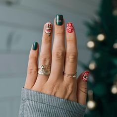 Christmas nail design ideas with elegant snowflakes and holly berry accents Holiday Glam