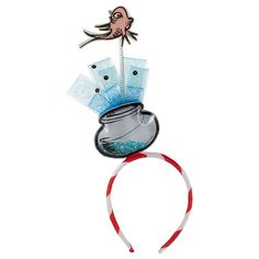 a headband with fish and money in it on top of a white background,