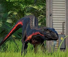 a large black dinosaur standing in the grass