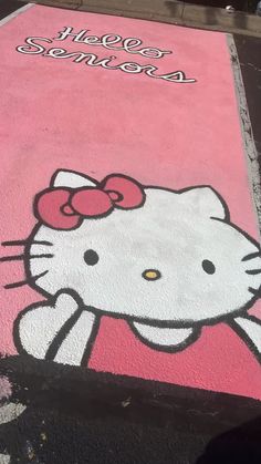 a hello kitty painted on the side of a building