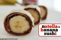 there is a nutella and banana sushi wrap on the table with a sticker that says nutella & banana sushi