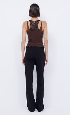 Inspired by a classic western silhouette, the BEC + BRIDGE Wilder Pant reinvents the iconic black trouser. Sitting low on the waist with a slight flare through the leg, the pant features a statement e-hook closure down the centre front with a suspended e-hook feature for a unique look. Pants are finished with a blind hem. Bec And Bridge Harriet Pants, Low Rise Woven Pants, Bec And Bridge Moon Dress, Bec And Bridge Sand Dress, Bec And Bridge Indi Maxi Dress, Western Silhouette, Layered Cami, Stretch Lace Fabric, Blind Hem