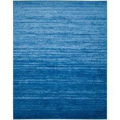 a blue rug with horizontal stripes on it