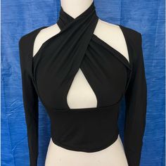 Women’s Crop Top Comes In Black Or Cream. Size M,L,And Xl Stretch Crisscross Top For Night Out, Crisscross Cross-tied Tops For Night Out, Chic Stretch Crisscross Tops, Chic Crisscross Stretch Tops, Chic Cross-tied Tops For Party, Trendy Crisscross Tops For Night Out, Black Tops With Crisscross Straps For Spring, Fitted Cross-tied Top For Night Out, Black Casual Top With Crisscross Straps